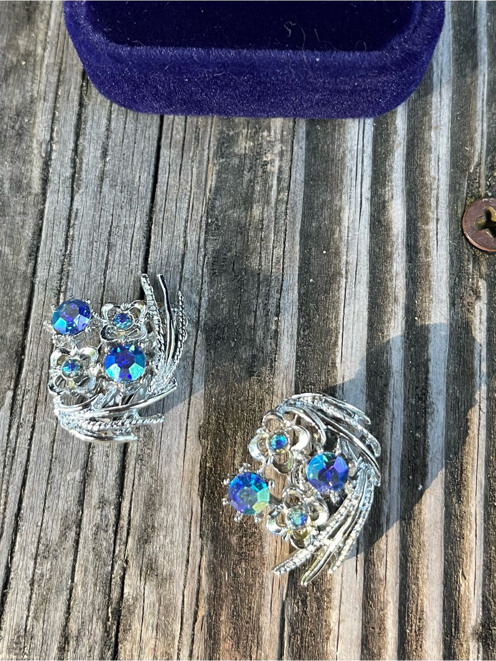 Silver-tone Floral Aurora Borealis Clip Earrings - Blue